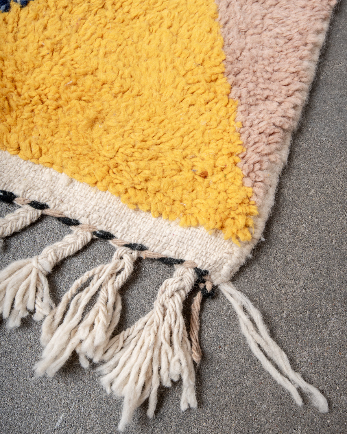 Modern, designer, handcrafted Berber rug from Morocco. Beniourain carpet with beautiful colours and patterns and fluffy wool texture.